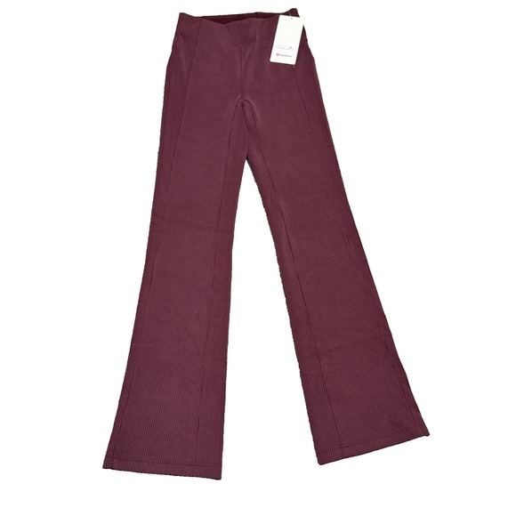 lululemon athletica Pants - Lululemon Ribbed Softstreme Flared Pant Tall. Size 4. Color:Garnet